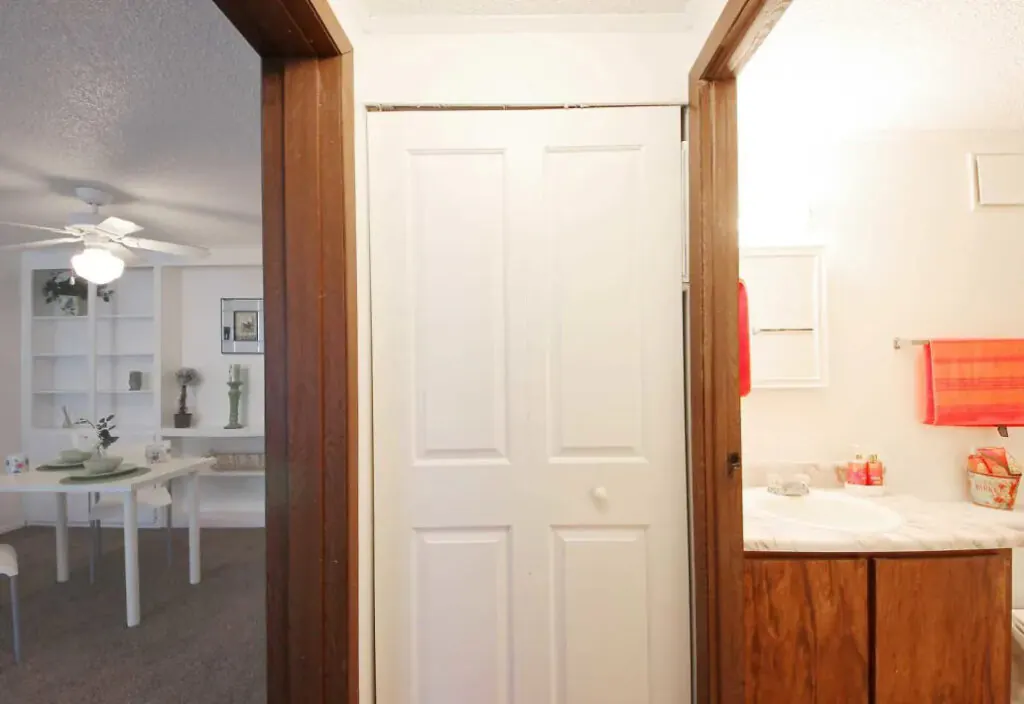 Heatherwood apartment interior with dining area and bathroom vanity