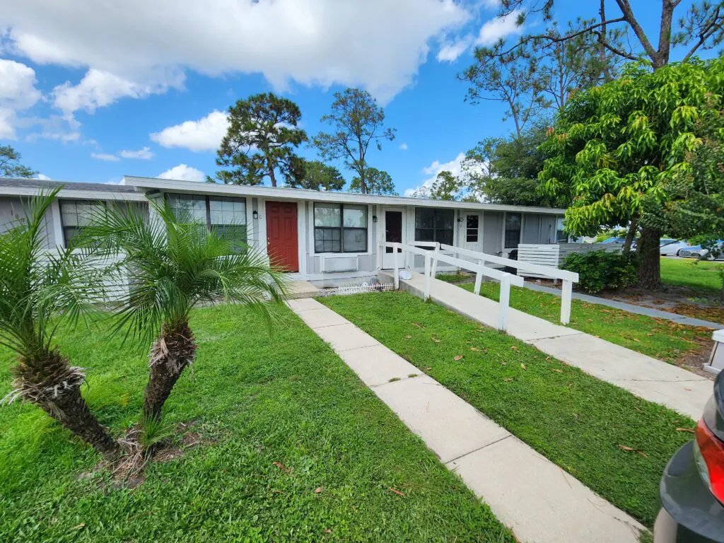 Accessible ramp and private apartment entries at Heatherwood Apartments