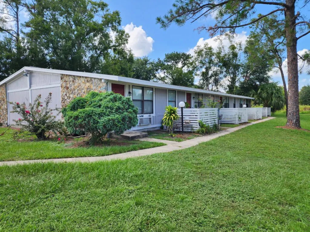 Heatherwood apartment building with landscaped lawn