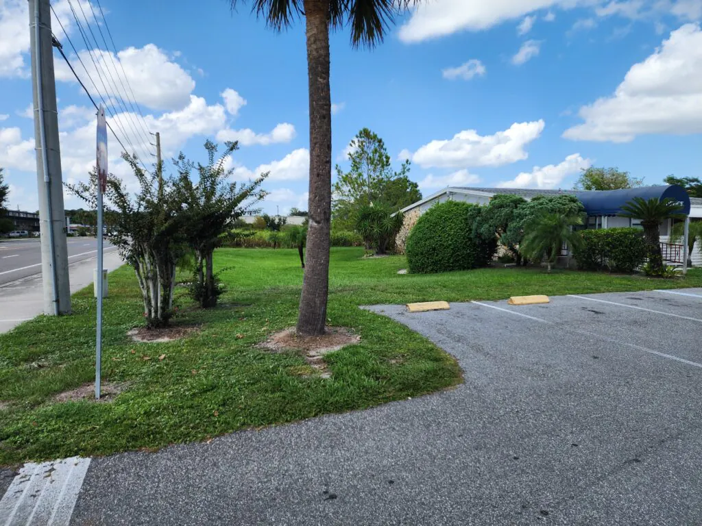 Heatherwood Apartments leasing office and landscaped entrance